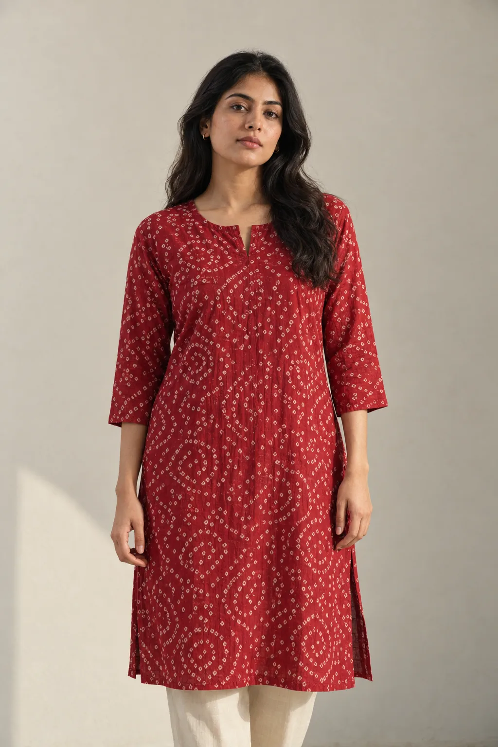 Red cotton kurta top with white bandhani dots