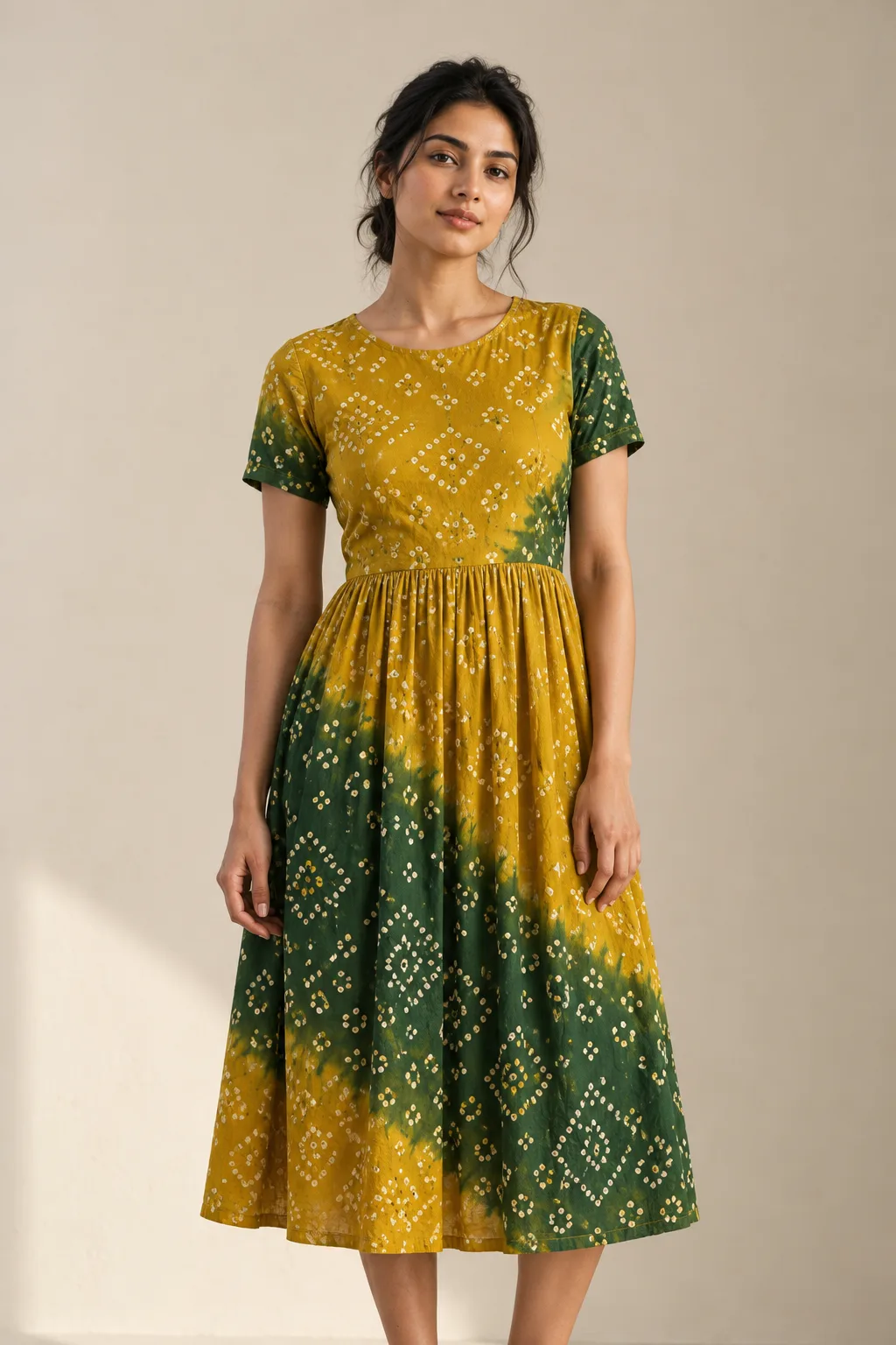 Yellow and green bandhani midi dress with a gathered skirt