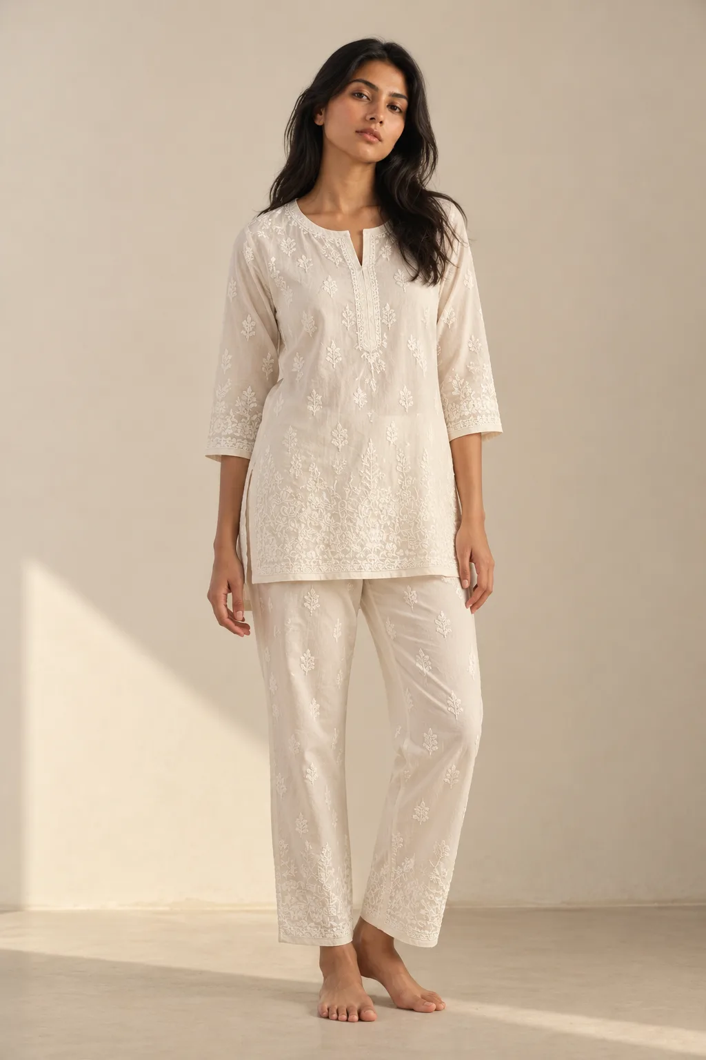 Ivory tunic and trousers with scattered chikankari motifs