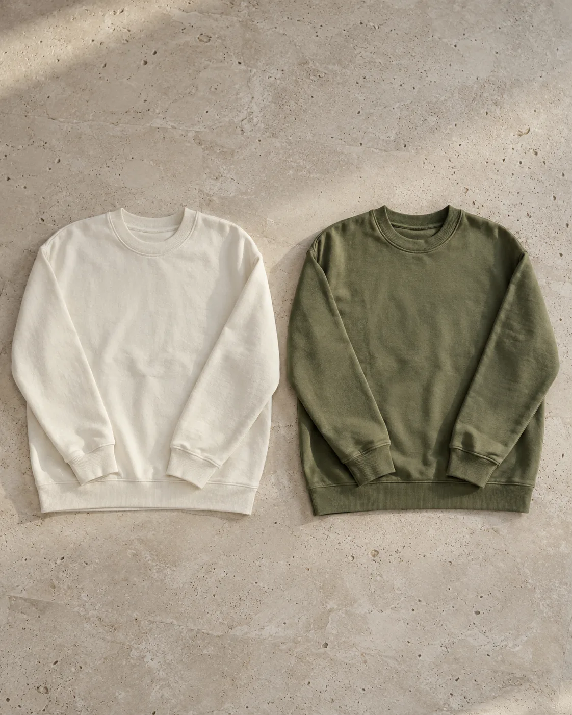 Natural-white and olive crew-neck sweatshirts with ribbed necks, cuffs and hems
