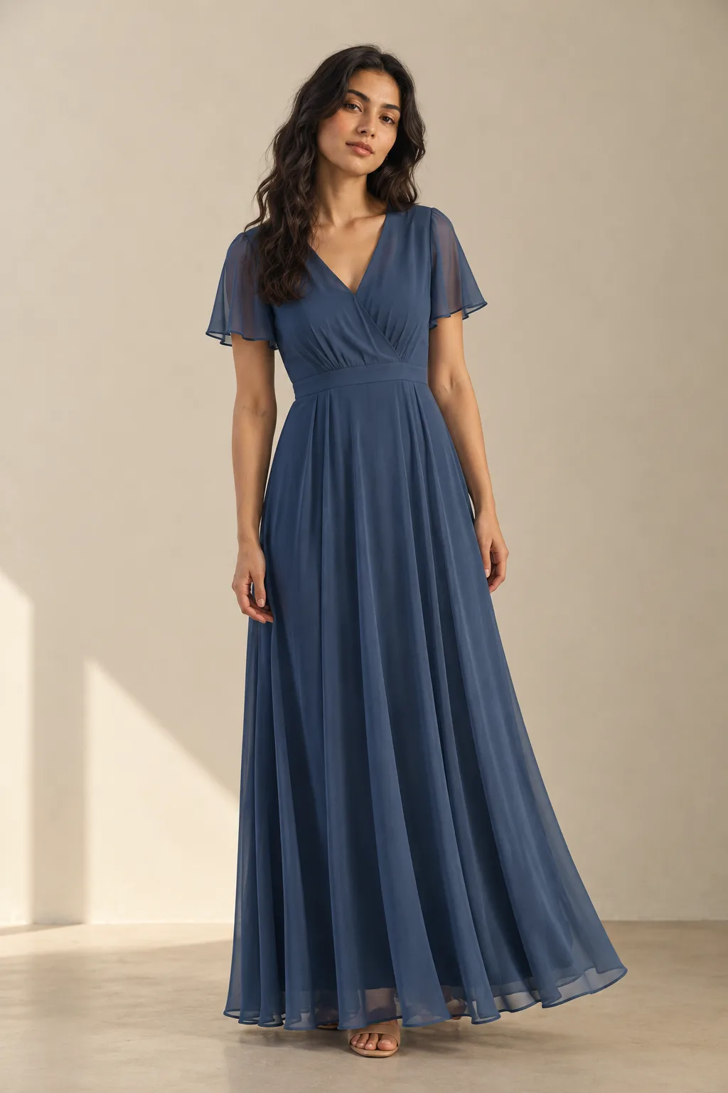 Dusky blue georgette maxi dress with a wrap bodice and sheer flutter sleeves
