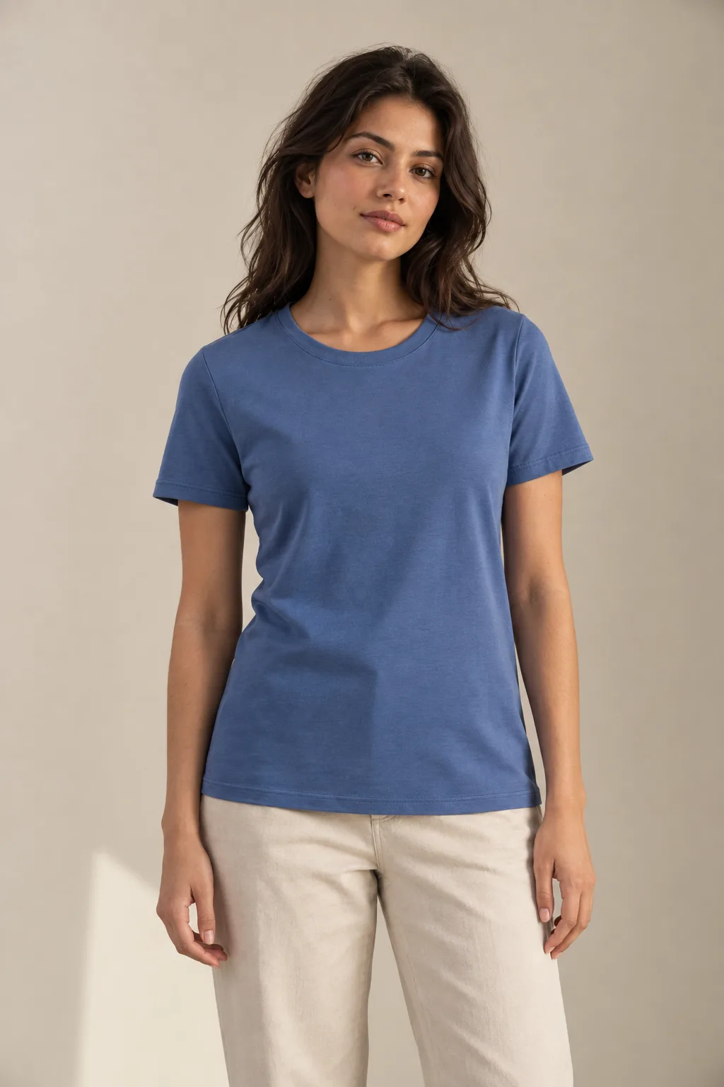 Woman wearing a blue crew-neck T-shirt