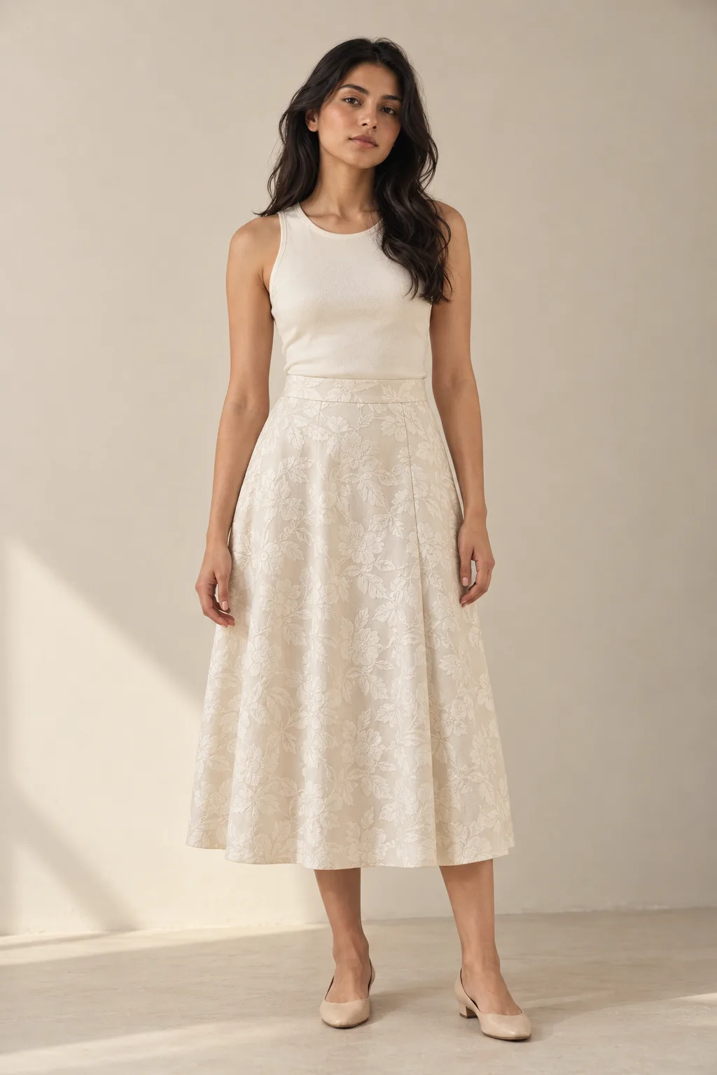 Ivory midi skirt with a tonal floral jacquard pattern