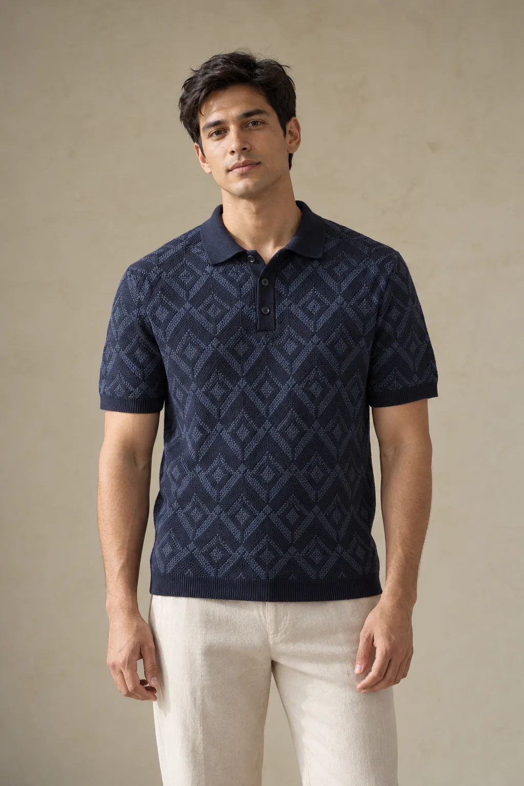 Navy knitted jacquard polo with a diamond pattern