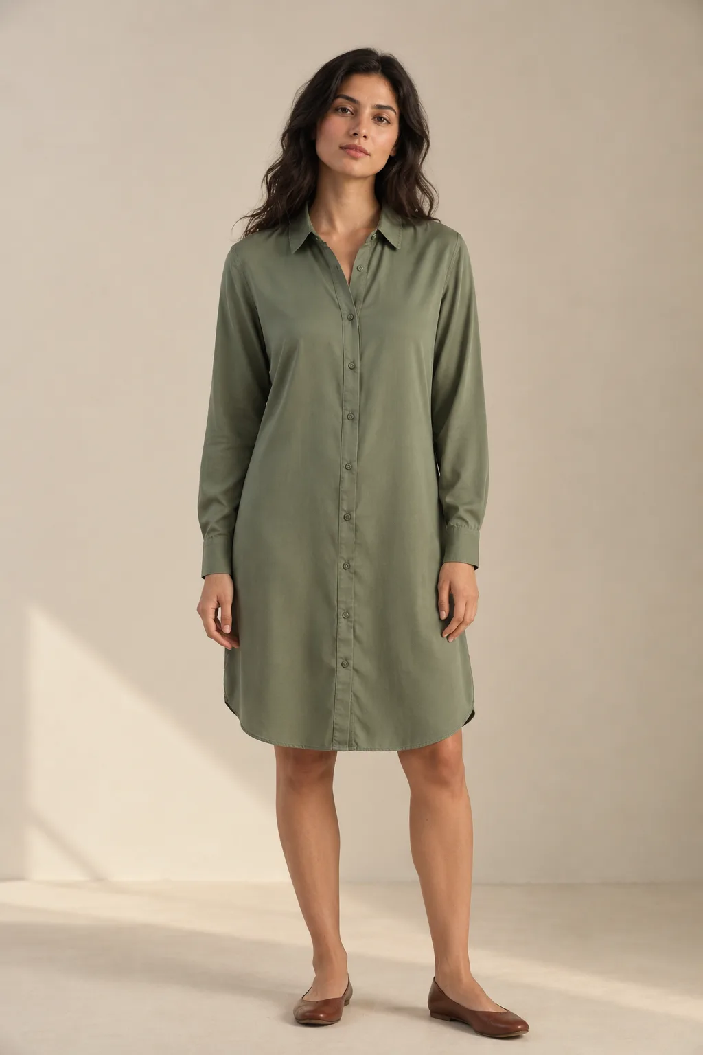 Sage lyocell shirt dress with long sleeves and a curved hem