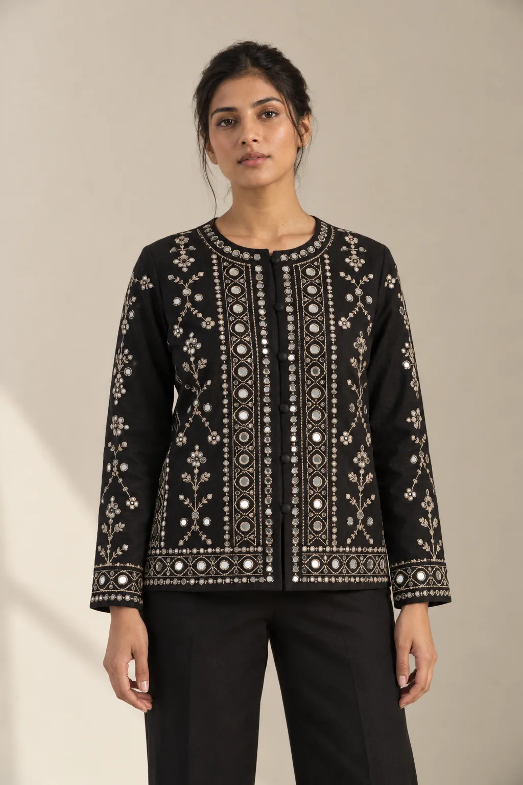 Black jacket with mirrors and cream thread embroidery on the fronts and cuffs