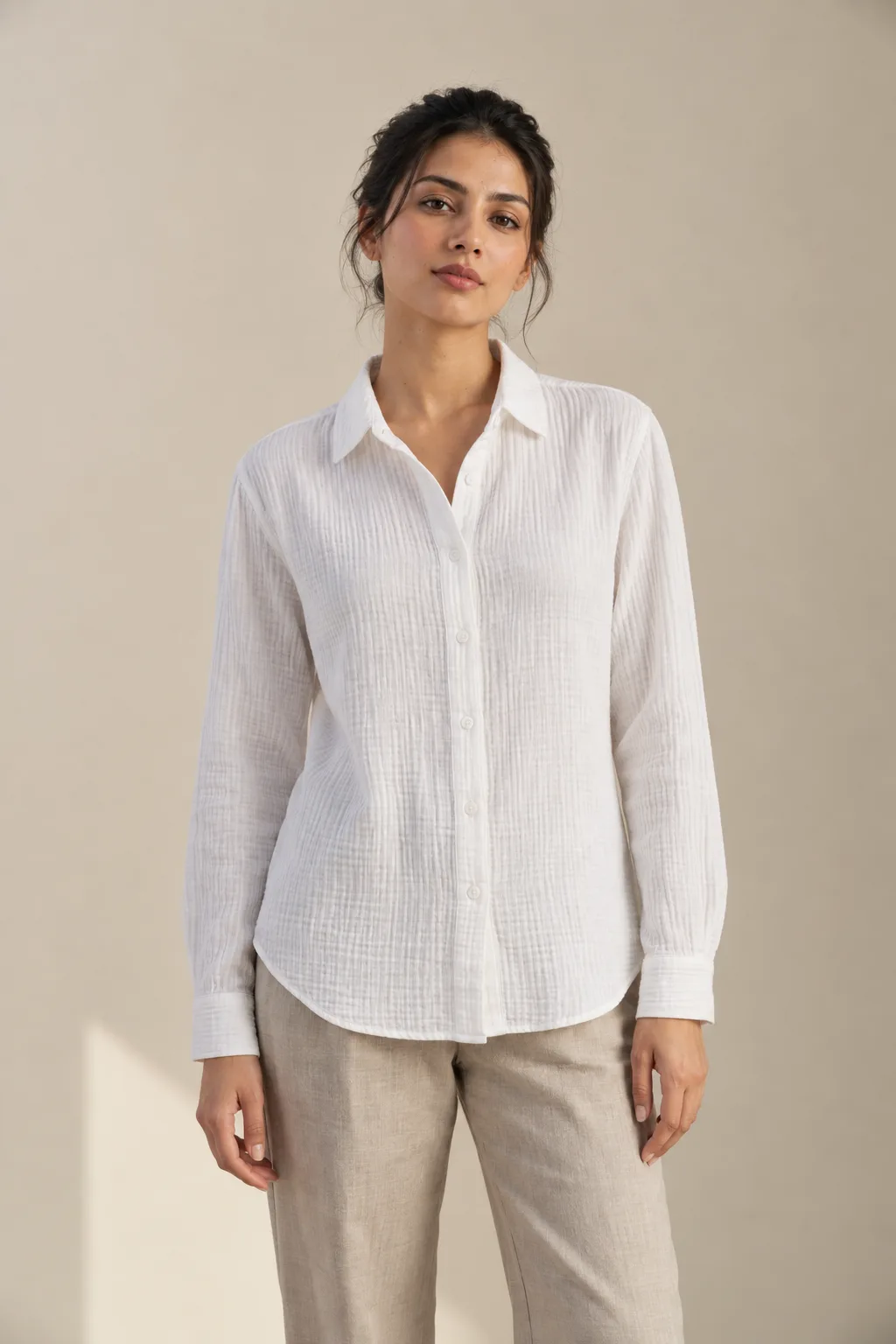 White long-sleeved double-gauze shirt with a crinkled texture