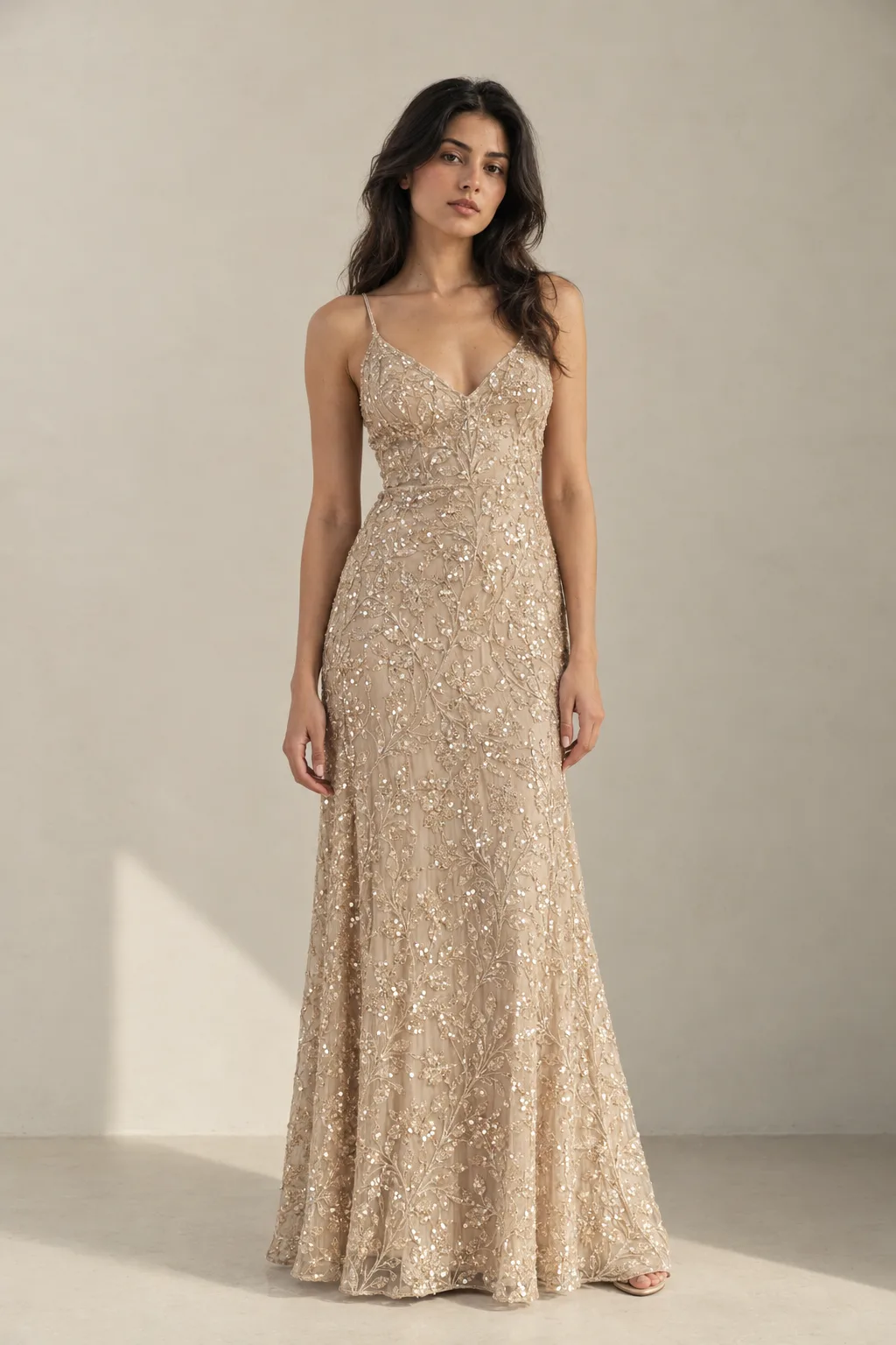 Champagne evening dress covered in sequin embroidery in a trailing floral pattern
