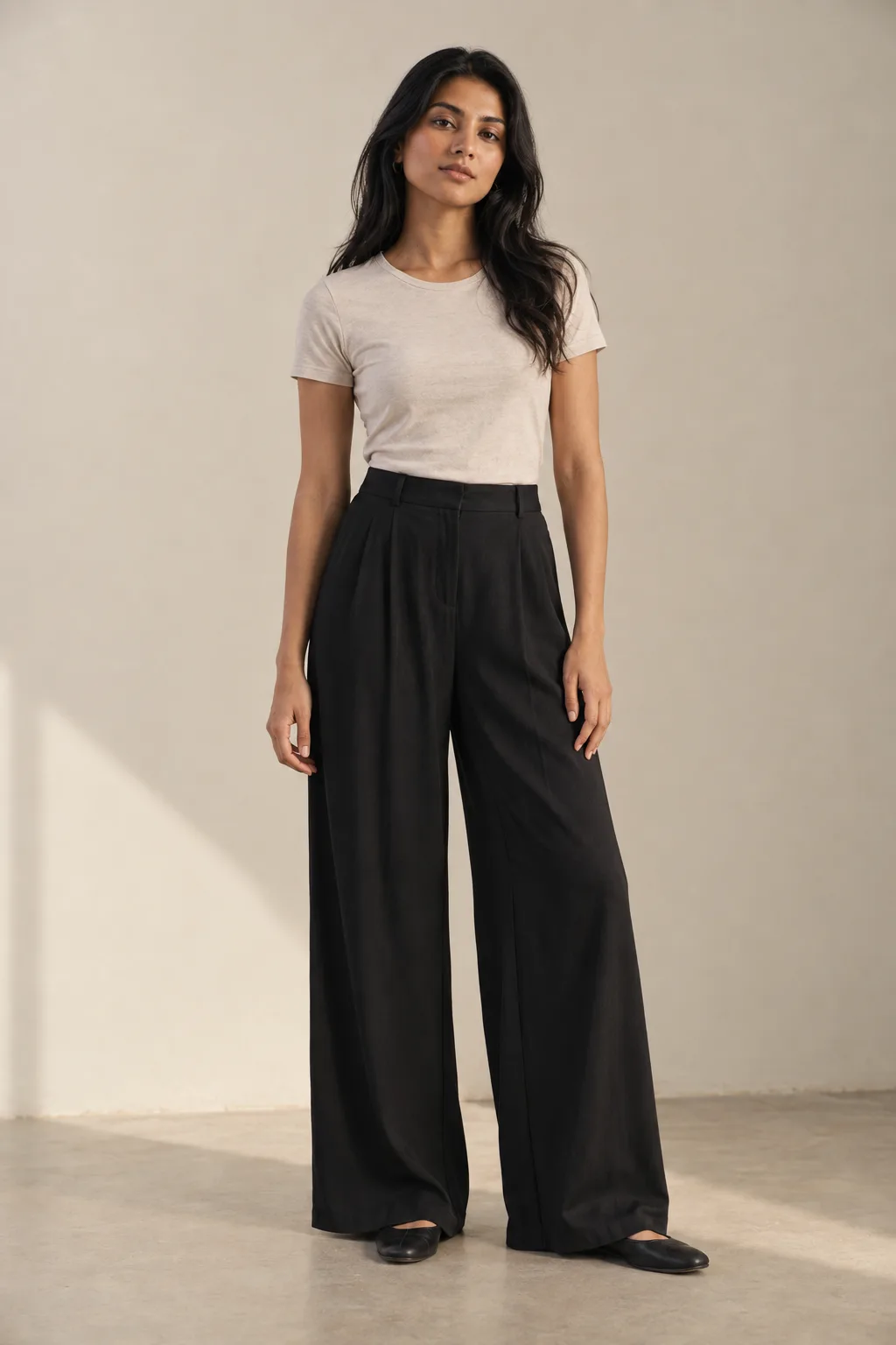 Black wide-leg trousers with front pleats