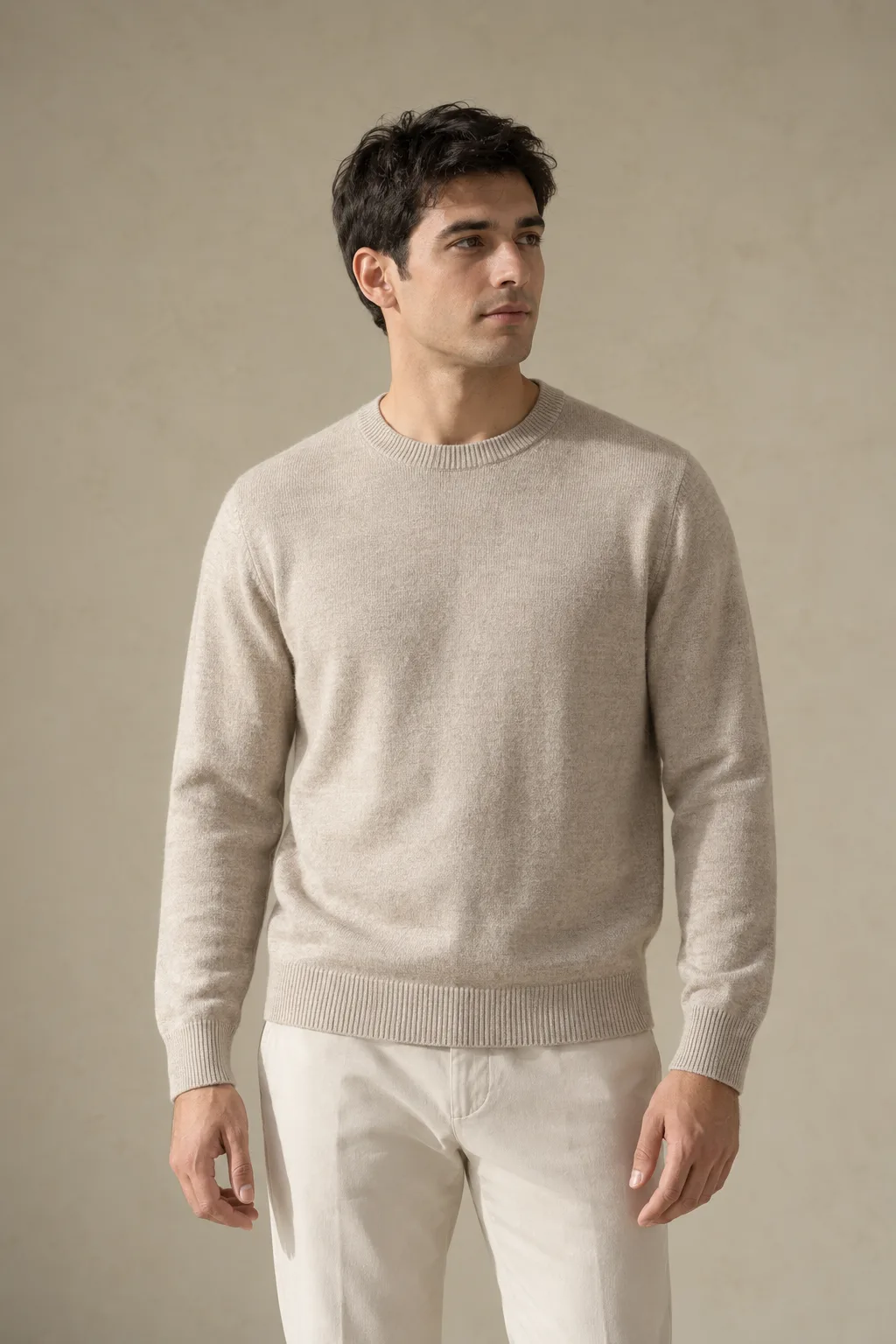 Man wearing an oatmeal crew-neck sweater