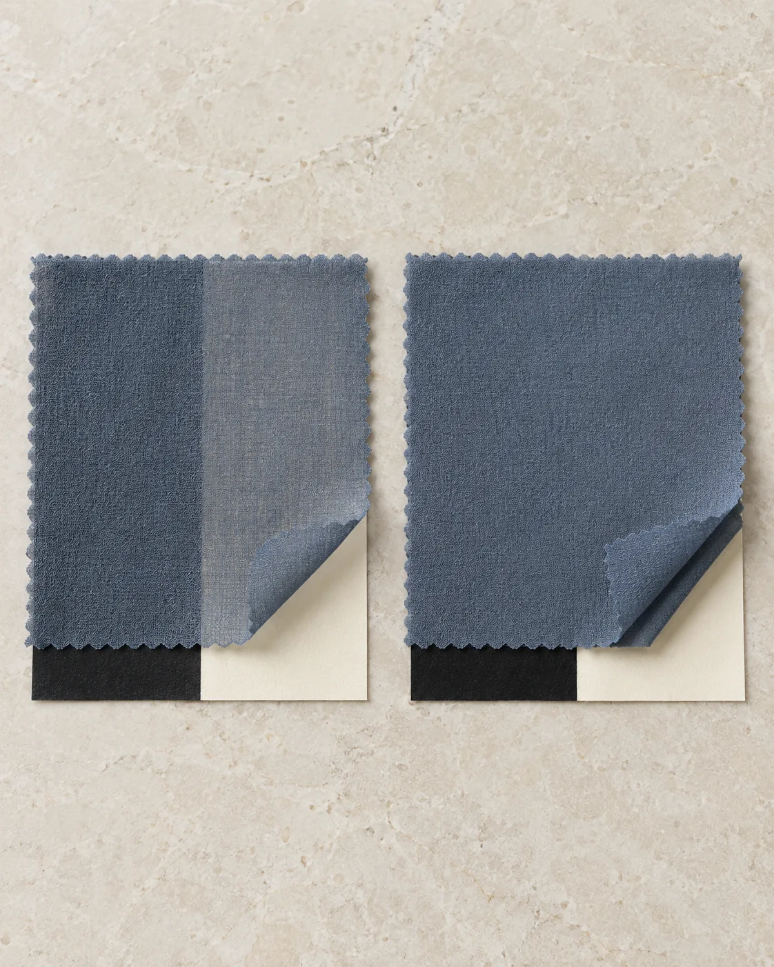 Two dusky blue georgette panels over black and ivory backings, with turned corners showing an unlined shell on the left and a separate lining on the right