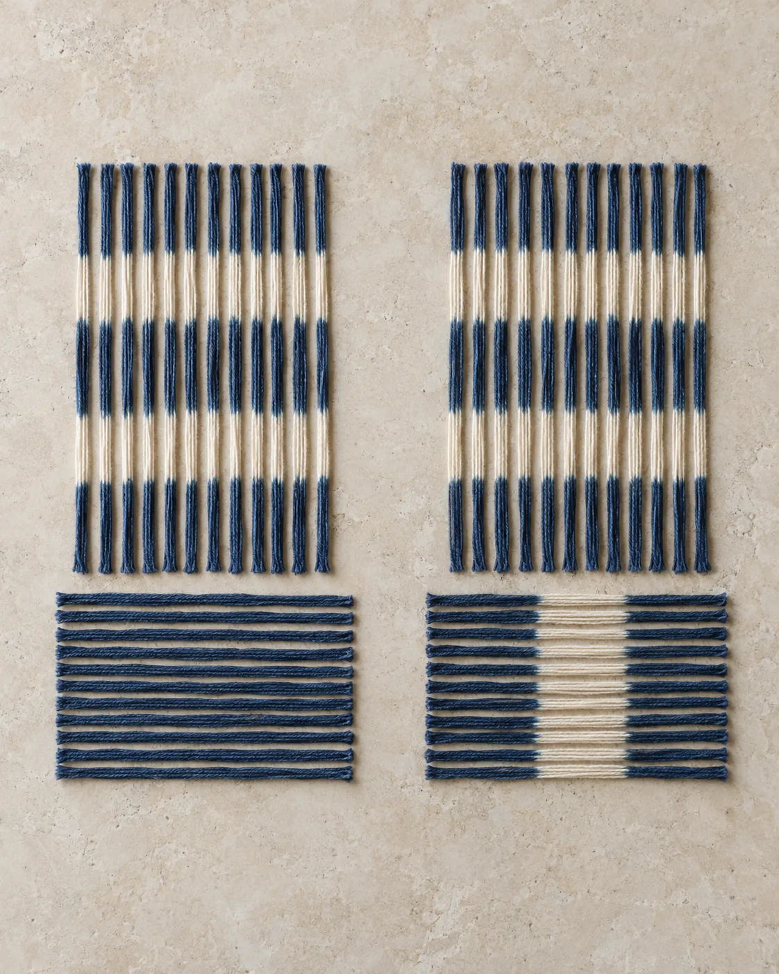 Two cotton yarn arrangements: patterned vertical yarn with plain indigo horizontal yarn on the left, both directions patterned in indigo and ivory on the right