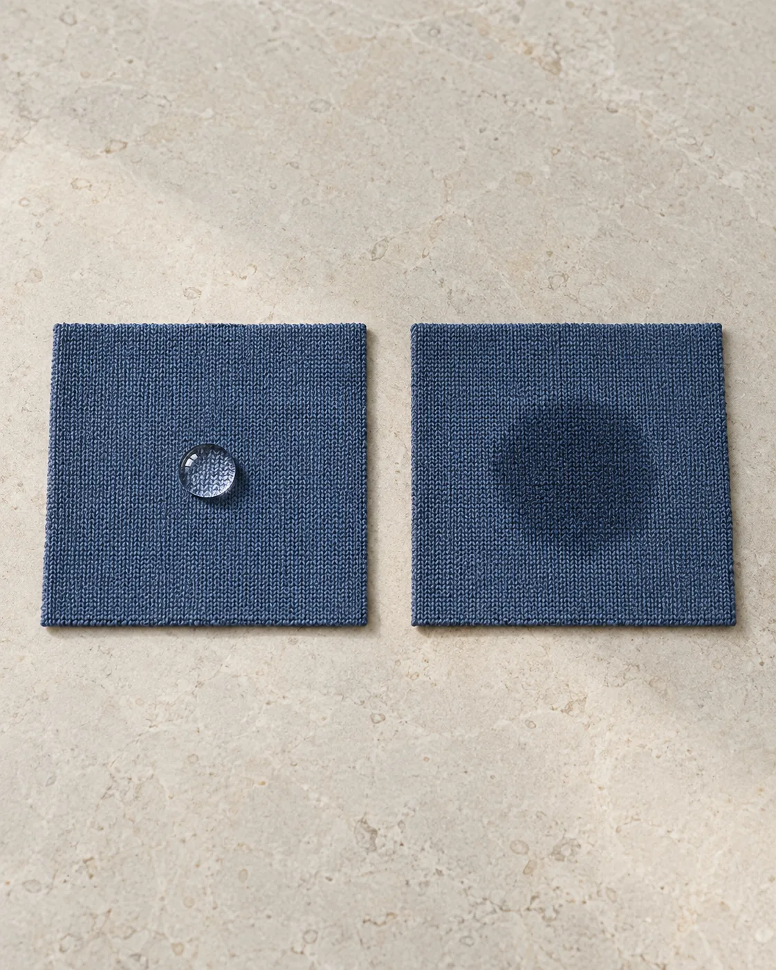 Two slate polyester knit squares, with a beaded water drop on the left and a spreading wet patch on the right