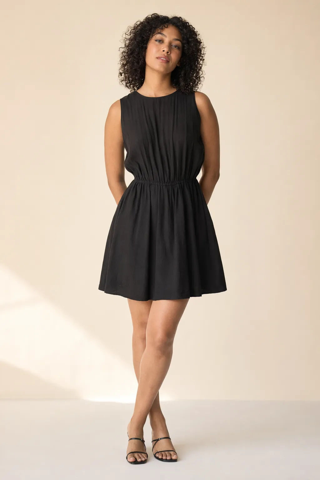 Woven woman black cinched waist mini dress