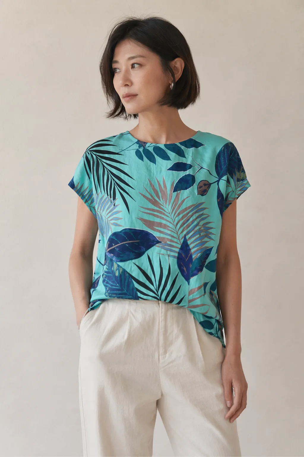 Woven woman mint tropical leaf top