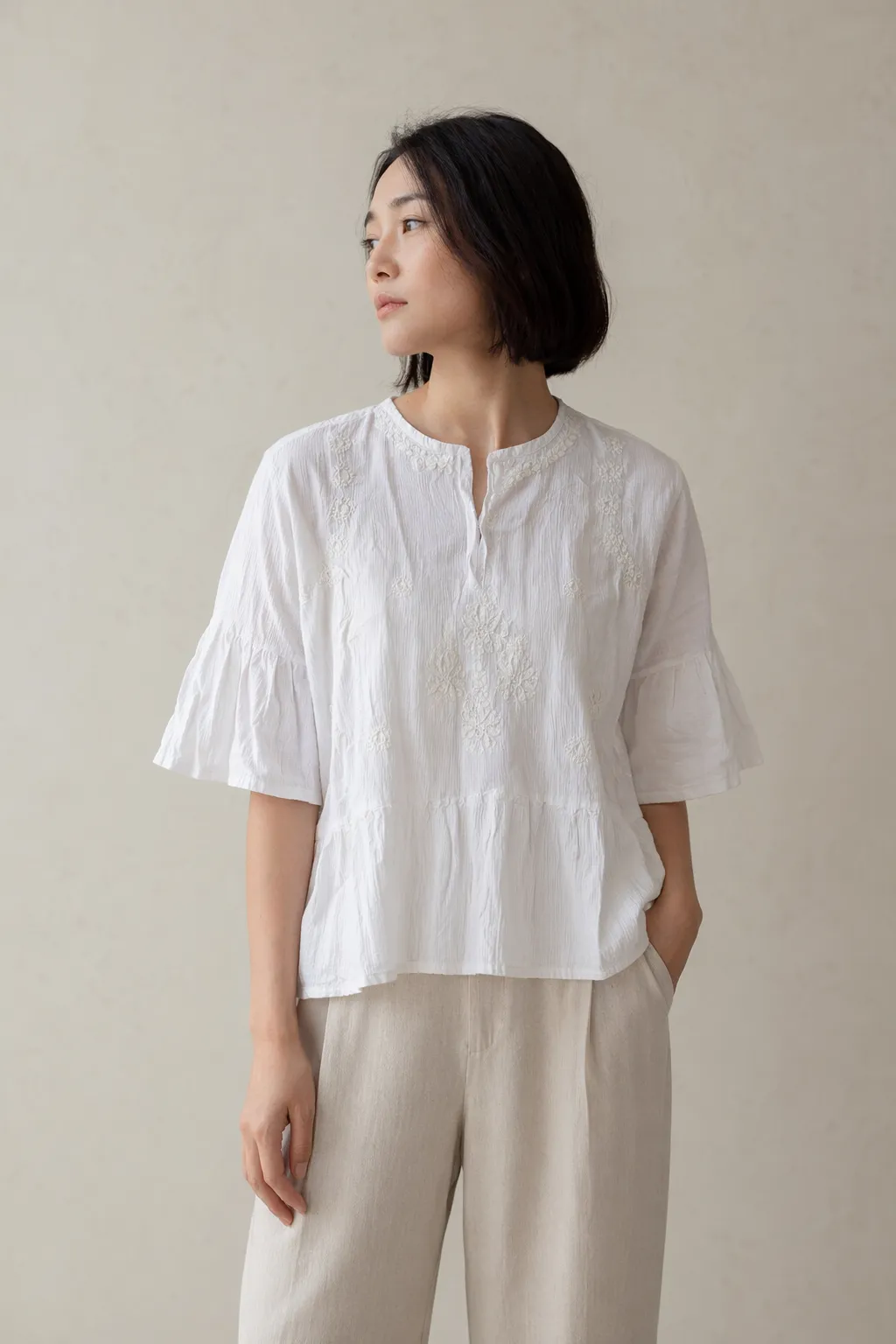 Woven woman white embroidered blouse