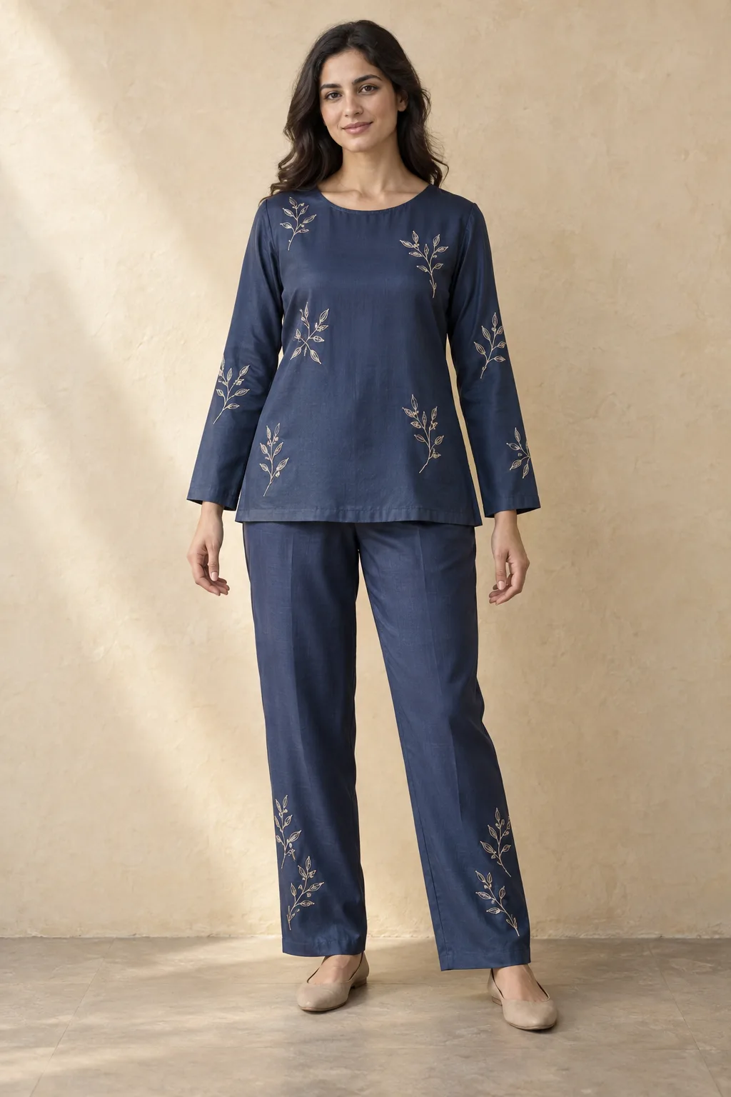 Navy silk top and trousers with scattered silver-coloured embroidered leaf outlines